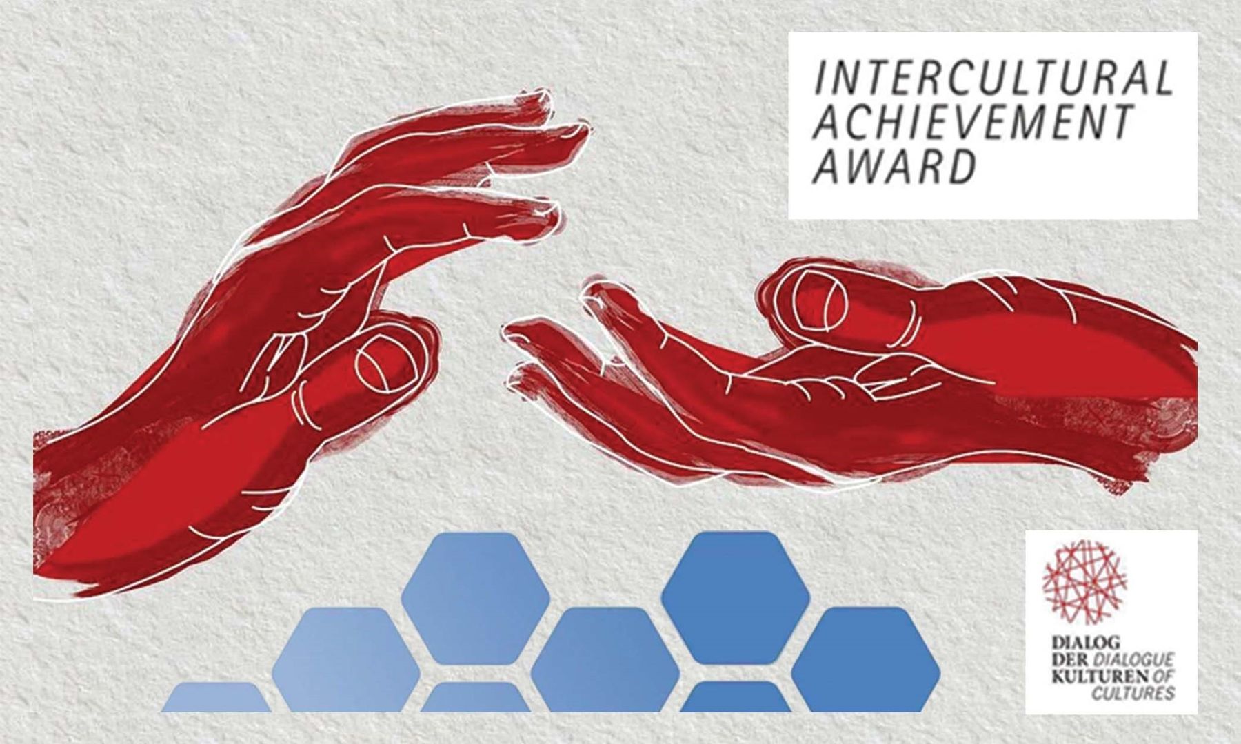 Czerwone dłonie na białym tle z napisem Międzykulturowa Nagroda